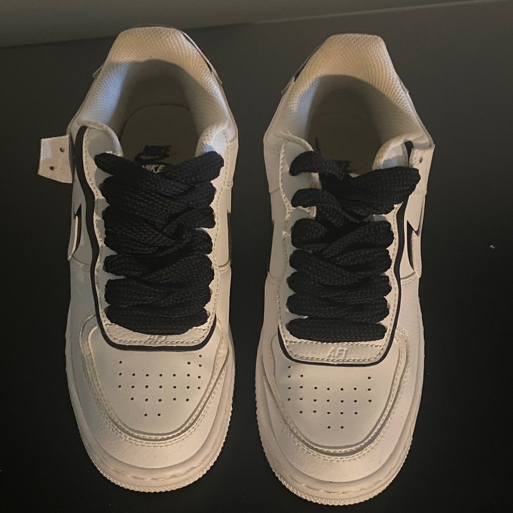 Nike White Low-Top Sneakers with Black Laces